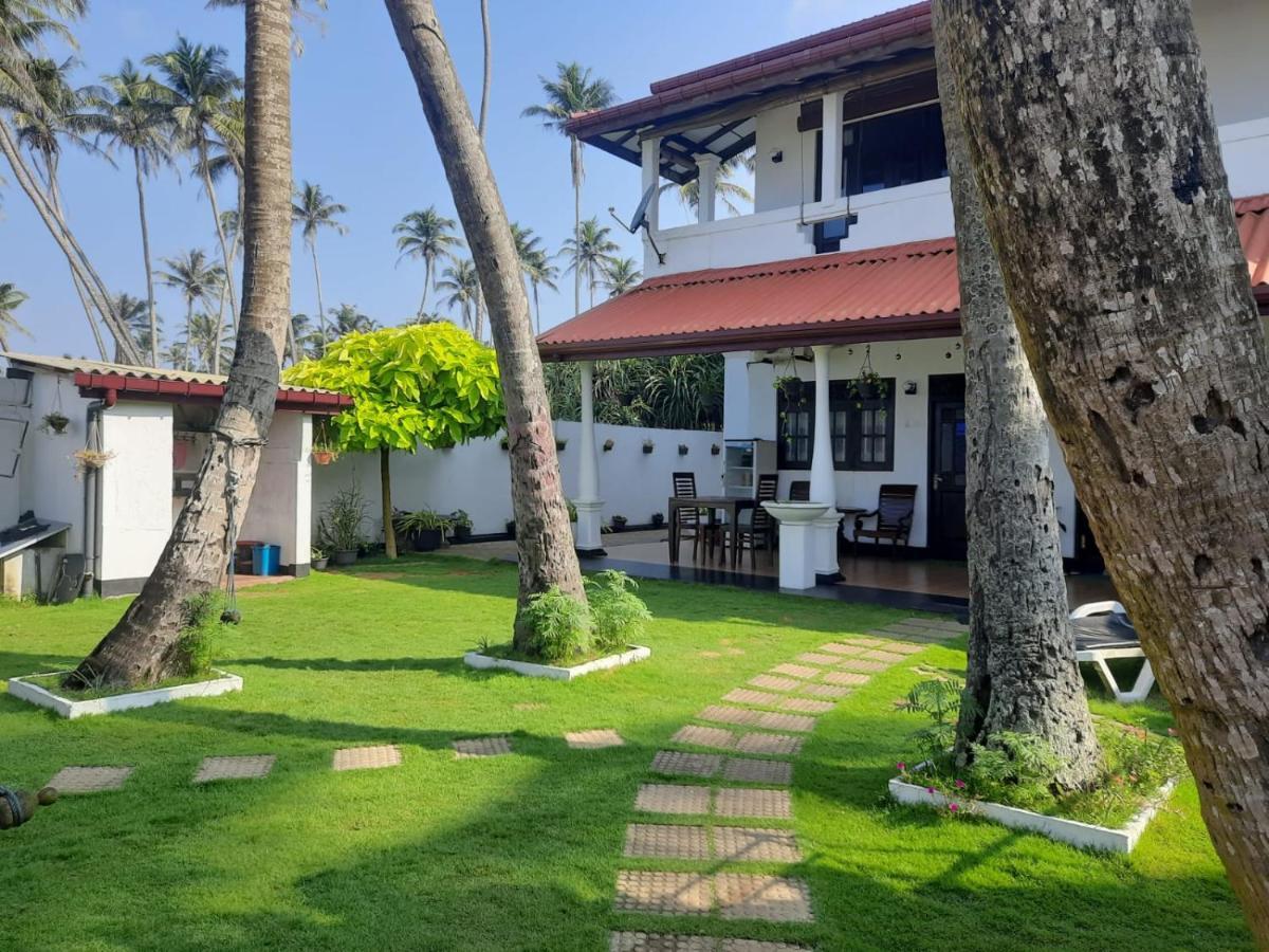 Ashen'S Beach House Boossa Bagian luar foto