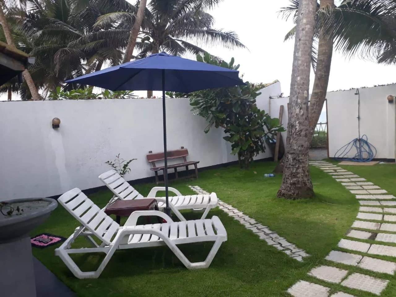Ashen'S Beach House Boossa Bagian luar foto